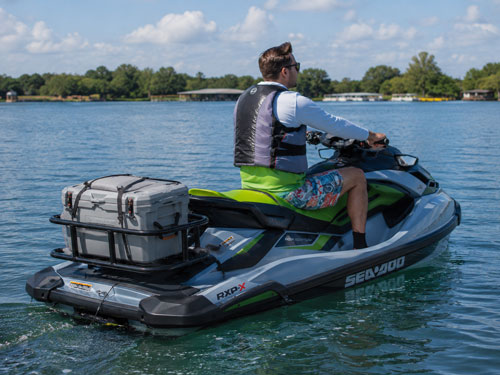 Sea-Doo jet ski riding on the water with Orcapak cooler rack installed